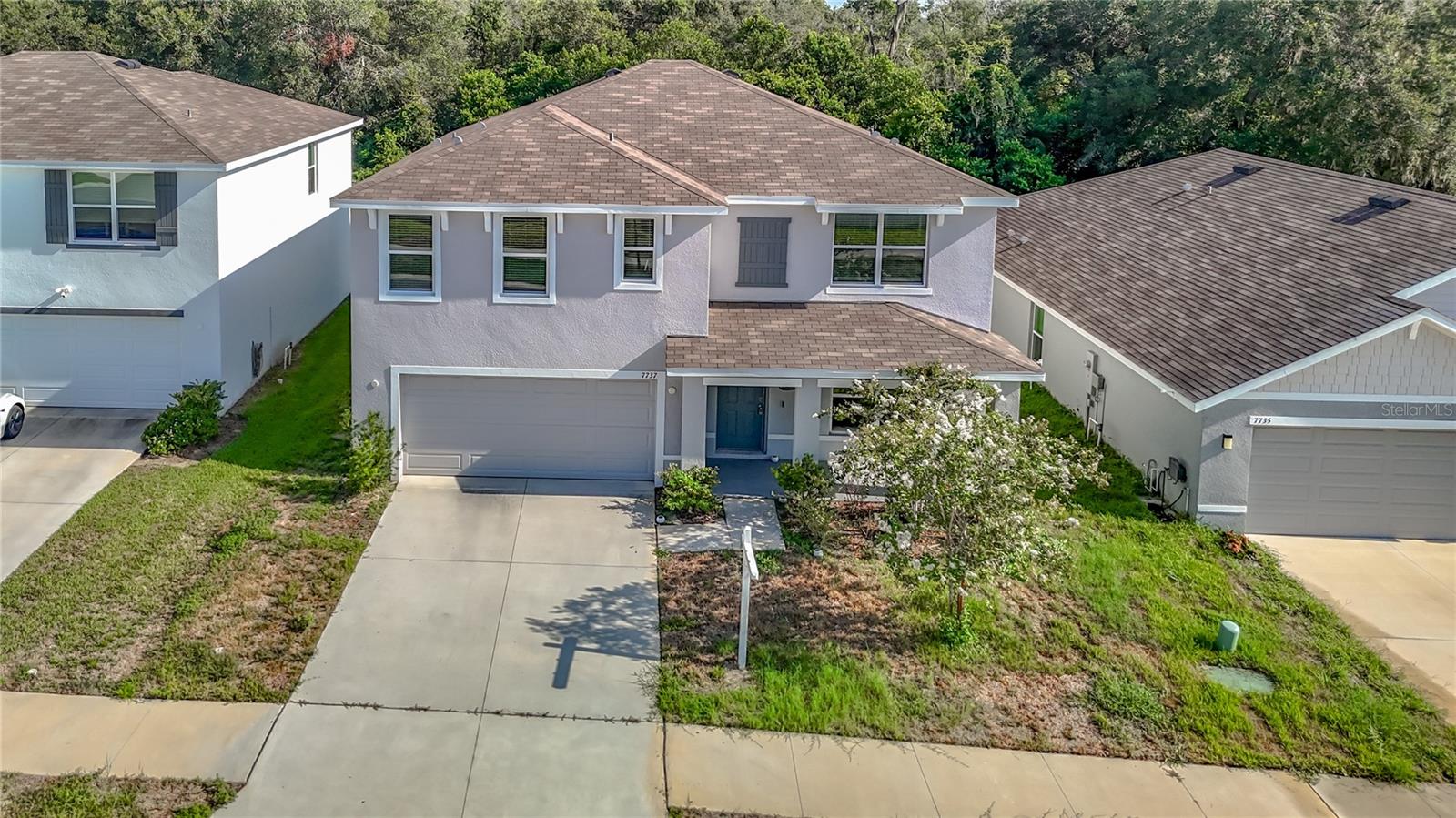7737 ROSEWOOD GARDEN LOOP