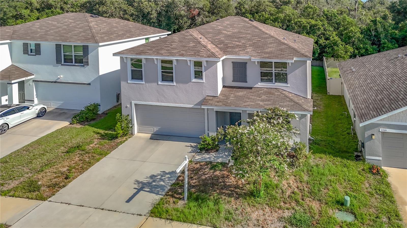 7737 ROSEWOOD GARDEN LOOP