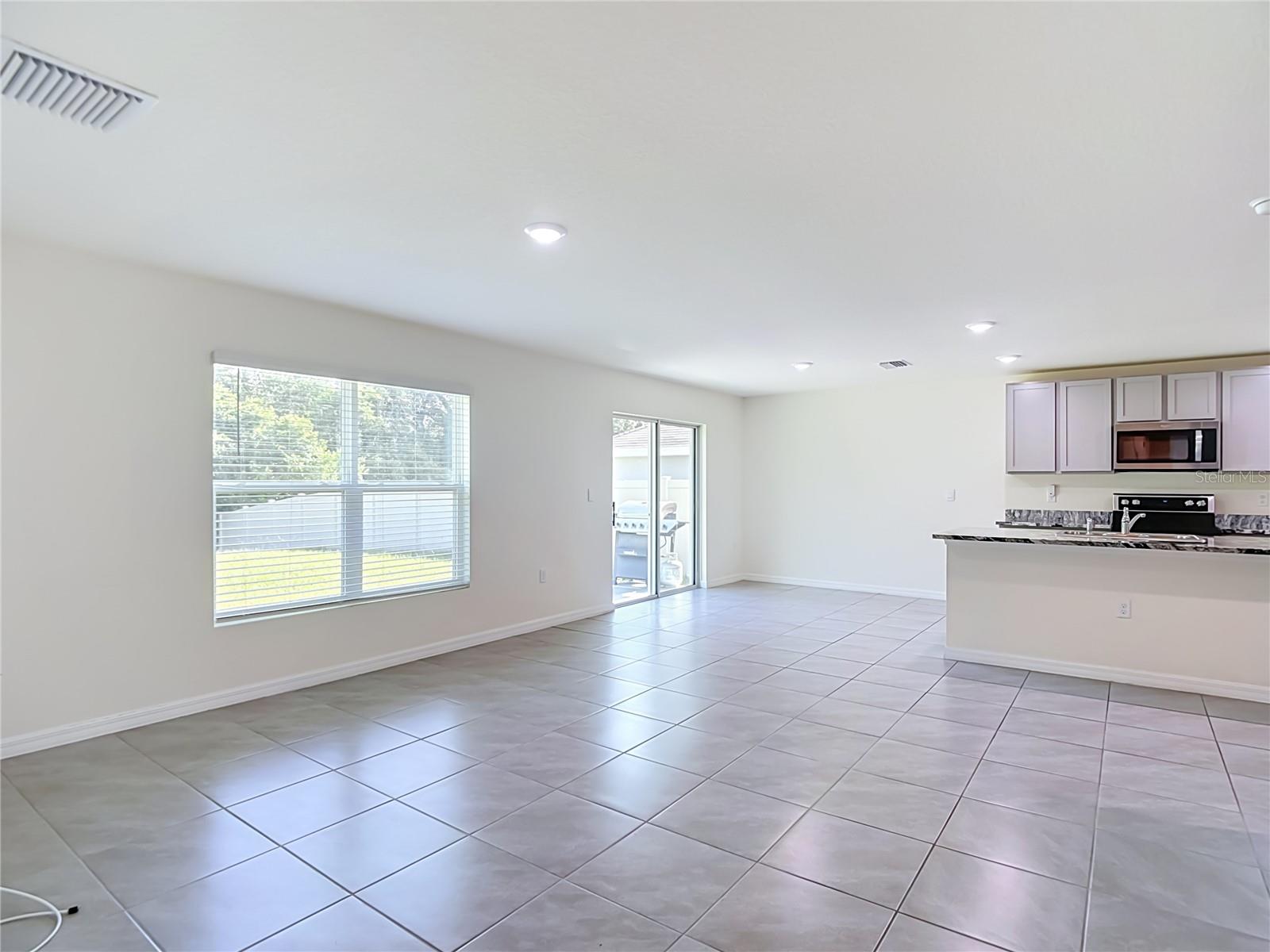 7737 ROSEWOOD GARDEN LOOP