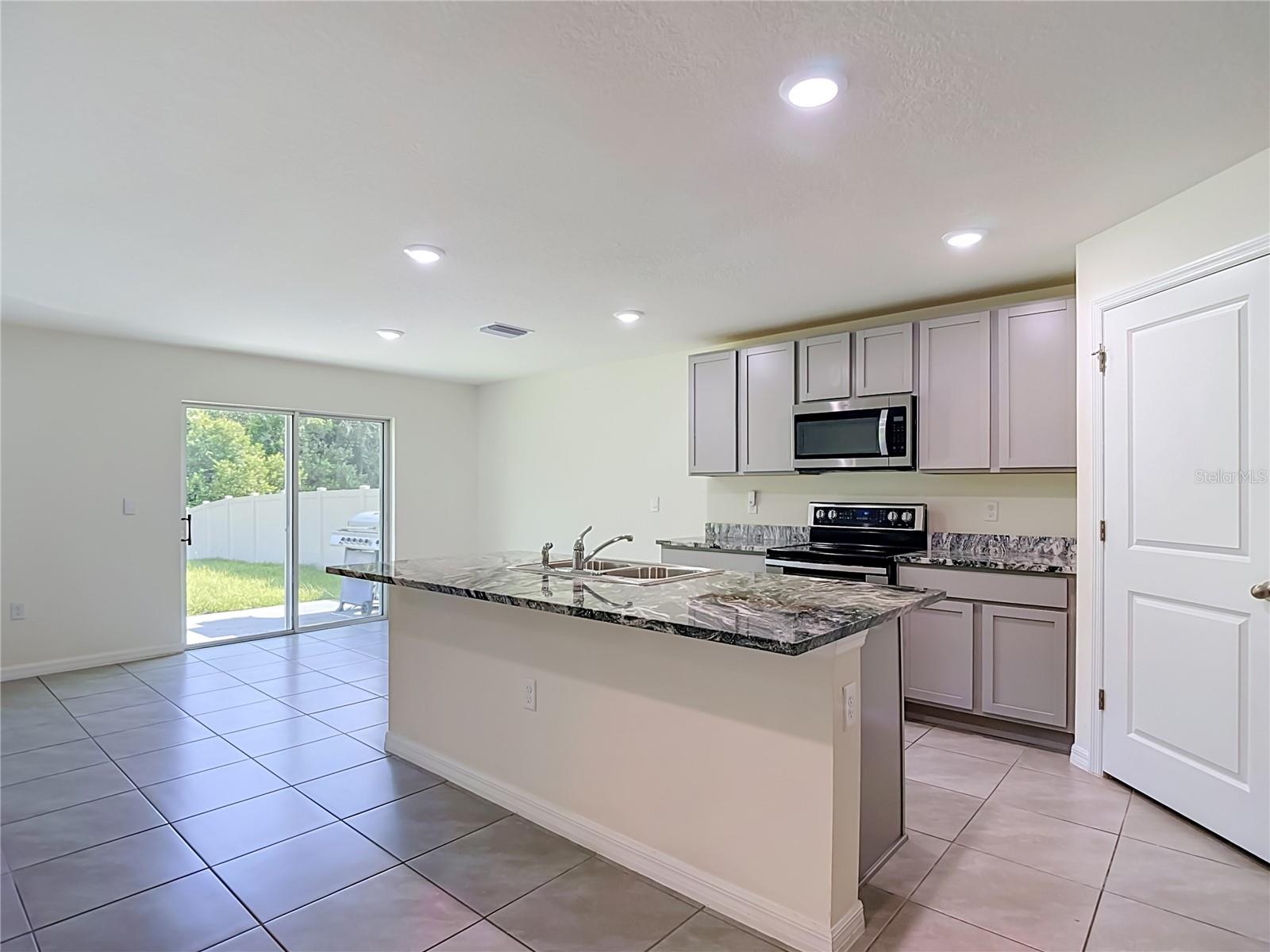 7737 ROSEWOOD GARDEN LOOP