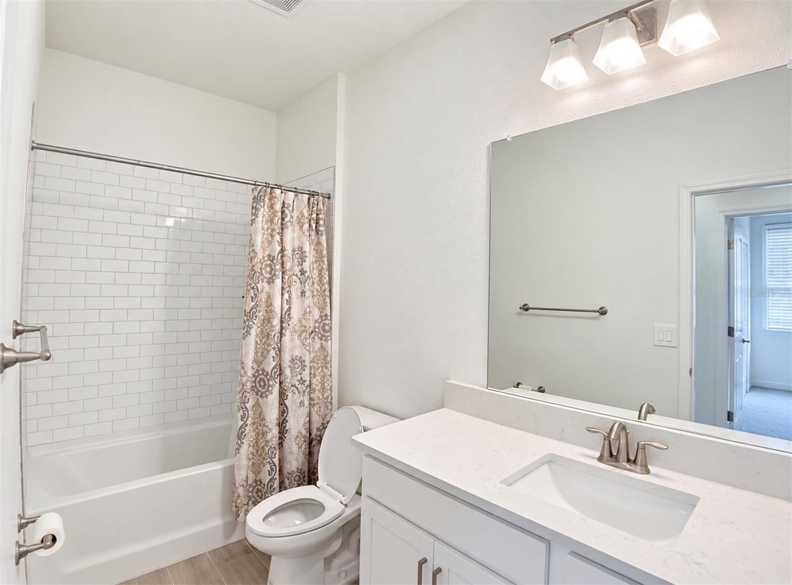 10060 BANYAN BREEZE BLVD