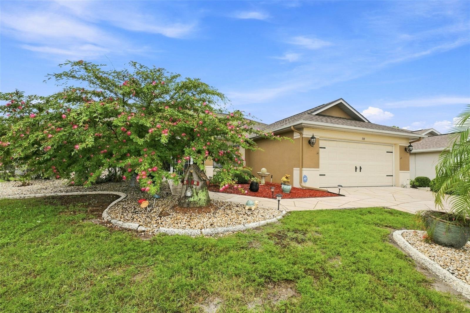 308 CALOOSA PALMS CT