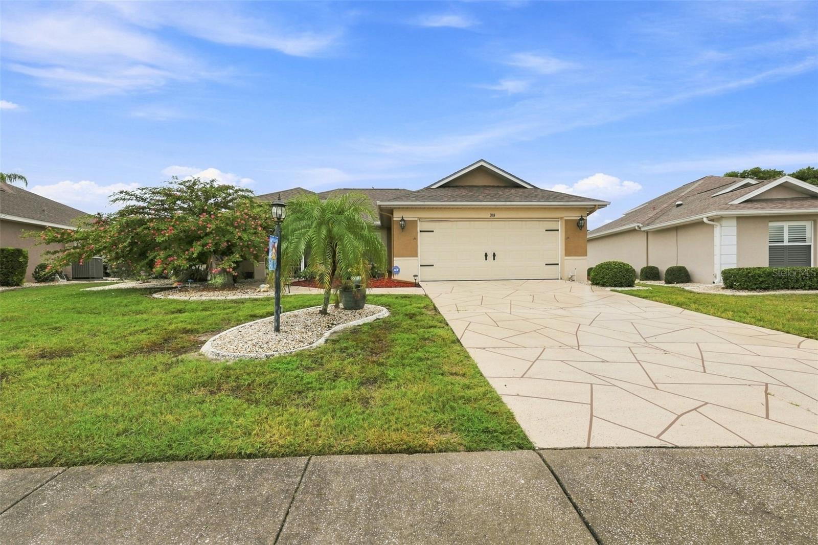 308 CALOOSA PALMS CT