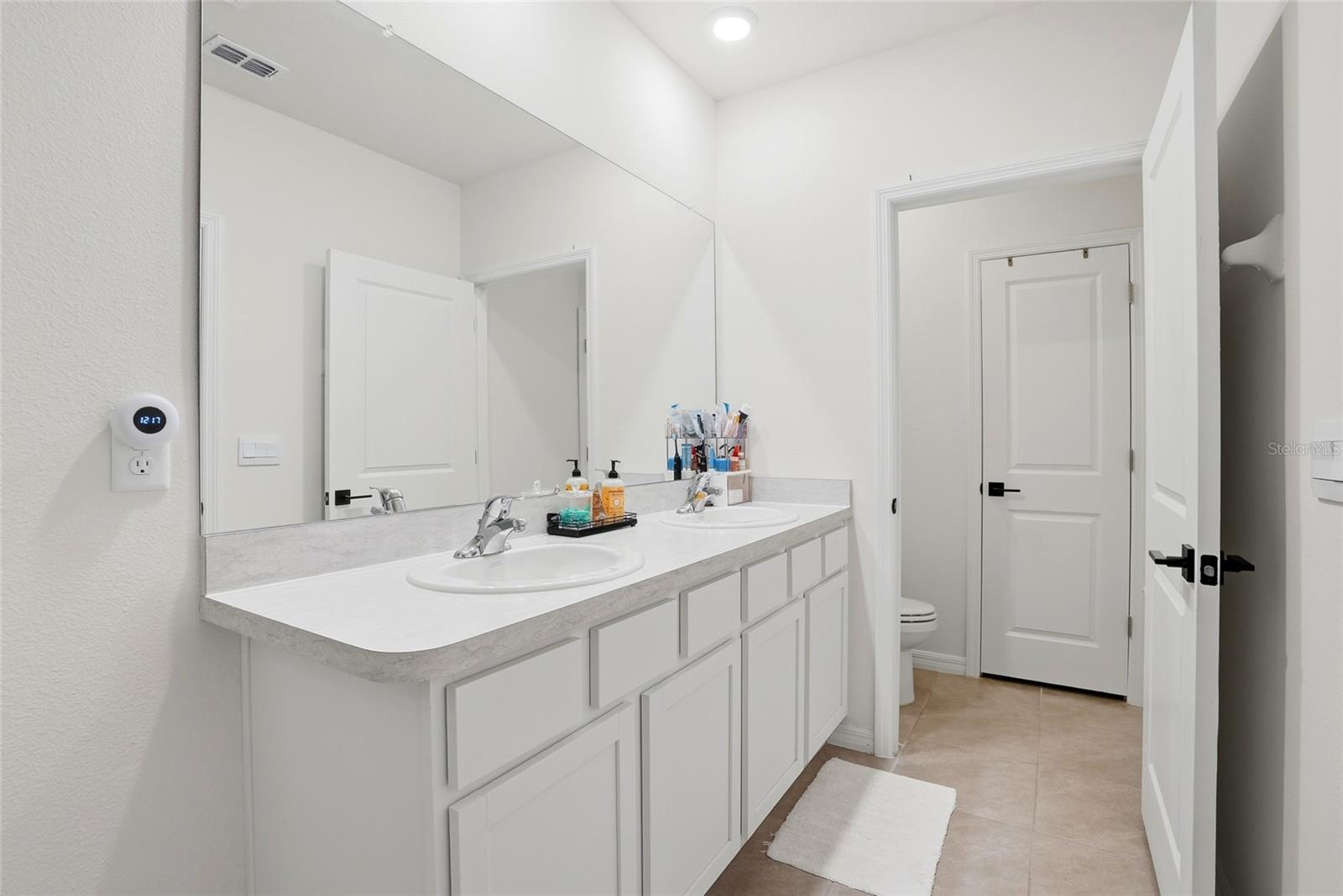 5674 CHORLEYWOOD LN