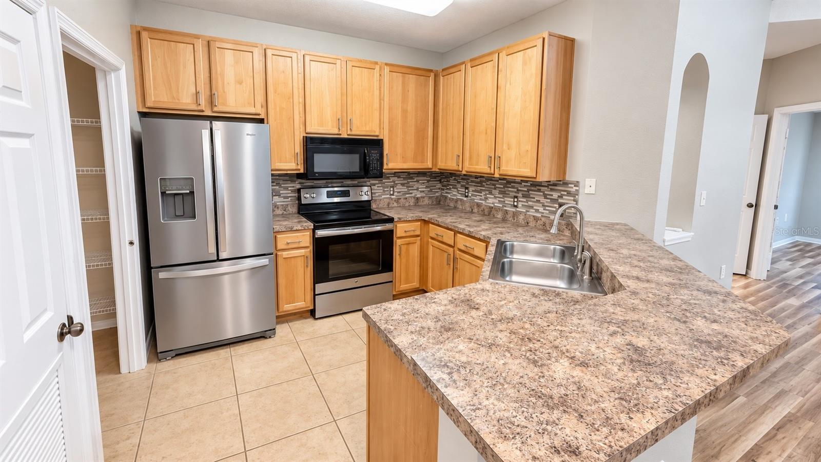 10209 COURTNEY PALMS BLVD #301